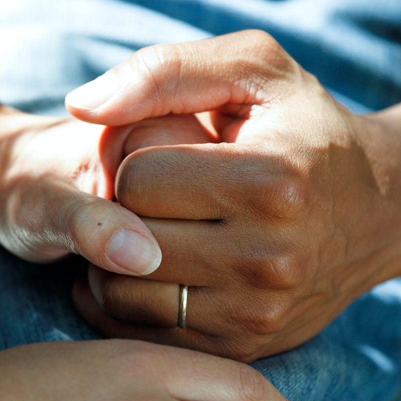 Supportive hand holding (national-cancer-institute-BxXgTQEw1M4-unsplash)-1