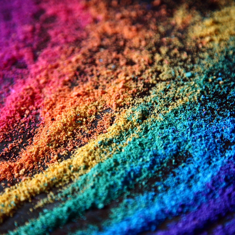 Rainbow-coloured grains of a sand